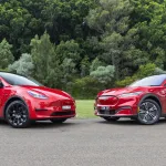 2024 Tesla Model Y vs Ford Mustang Mach-E electric SUV comparison review
